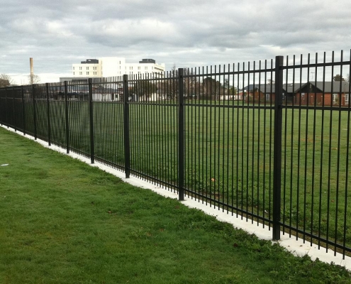 Image showing steel security fencing surrounding school playing fields