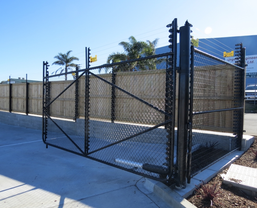 Image showing an automated gate on a commercial premises, installed by Fencerite