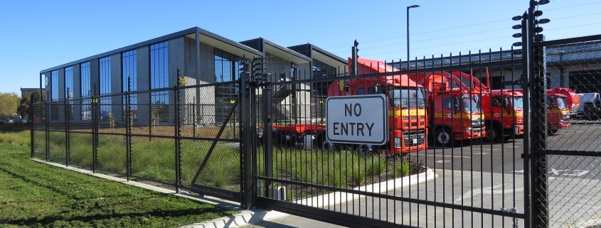 Image showing an entrance to Waste Management, including an automated gate, installed by Fencerite