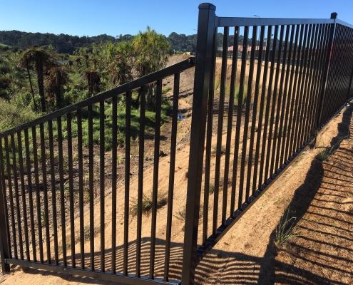 Image showing black balustrades surrounding the top of a gully, installed by Fencerite