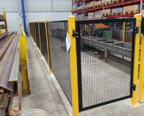 Image showing a storage enclosure within an industrial building, installed by Fencerite