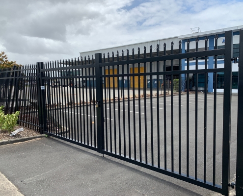 Image showing the entrance to a commercial building, with swing gate, installed by Fencerite