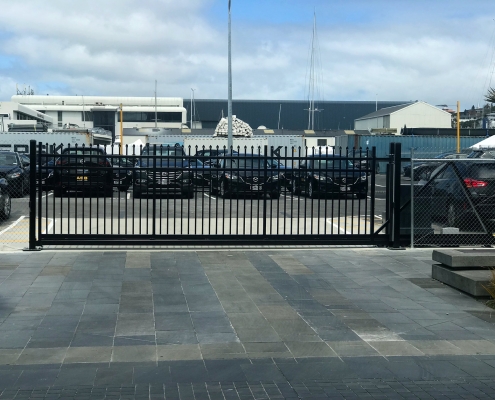 image of Commercial Sliding Gates surrounding a carpark